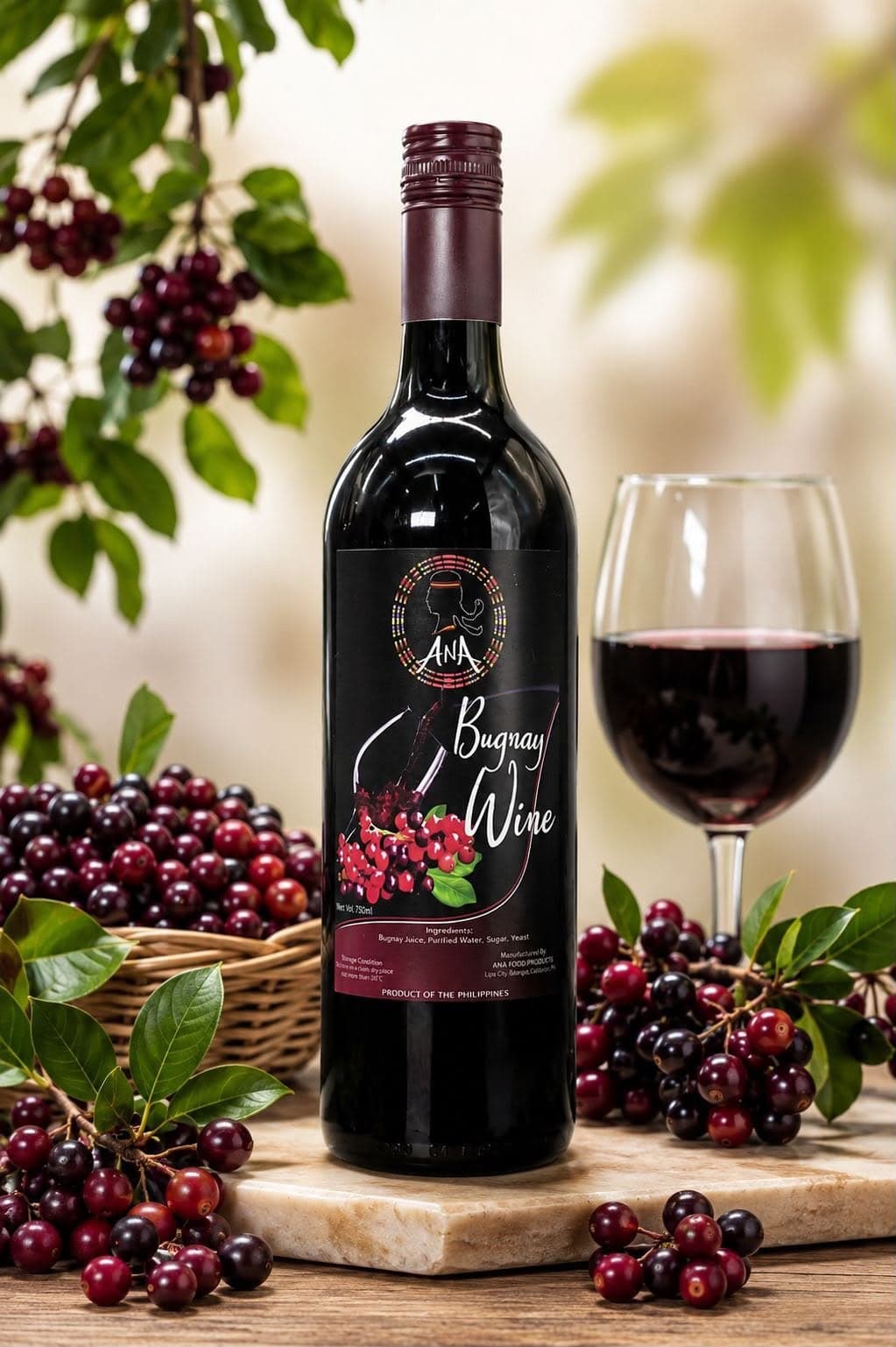 Bottle of ANA Bugnay Wine beside a glass of red wine and bugnay berries